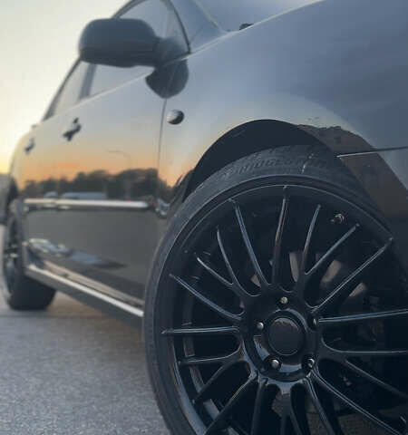 Черный Мазда 3, объемом двигателя 2 л и пробегом 188 тыс. км за 5700 $, фото 4 на Automoto.ua