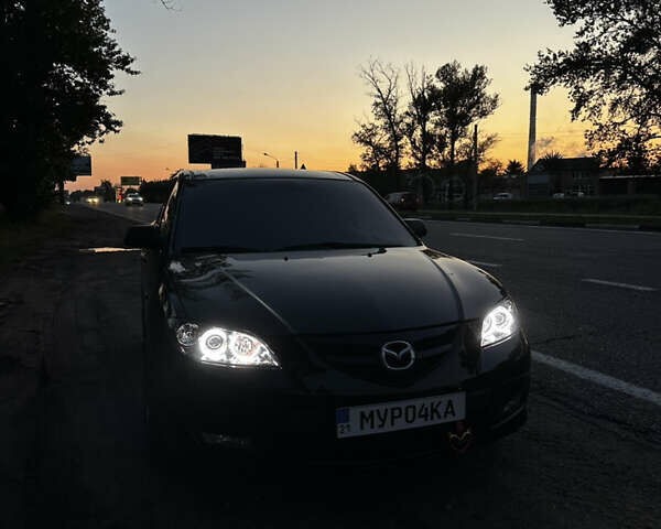Черный Мазда 3, объемом двигателя 2 л и пробегом 188 тыс. км за 5700 $, фото 3 на Automoto.ua