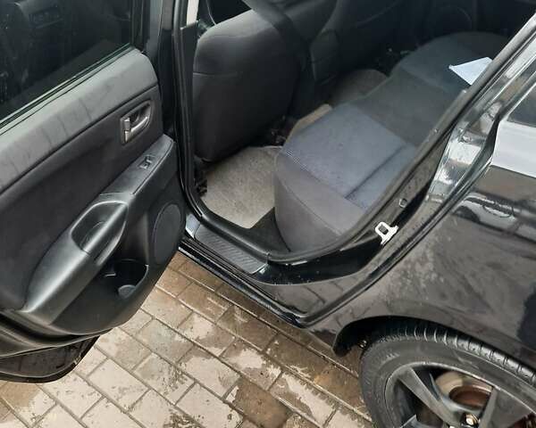 Чорний Мазда 3, об'ємом двигуна 2 л та пробігом 240 тис. км за 5999 $, фото 17 на Automoto.ua
