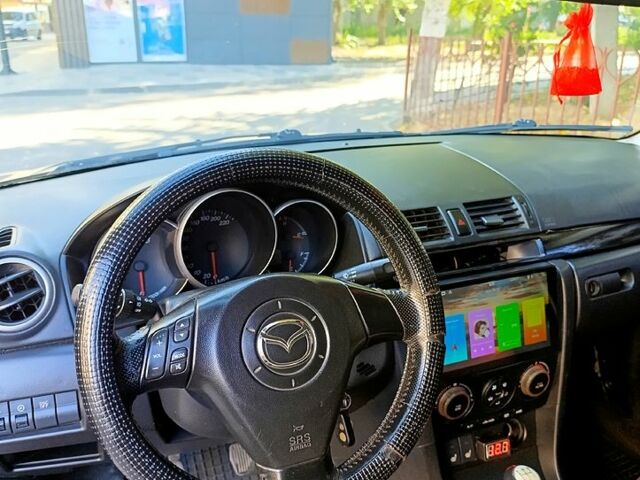 Черный Мазда 3, объемом двигателя 2 л и пробегом 281 тыс. км за 3250 $, фото 7 на Automoto.ua