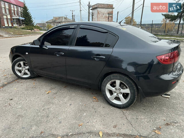 Чорний Мазда 3, об'ємом двигуна 1.6 л та пробігом 346 тис. км за 4600 $, фото 7 на Automoto.ua
