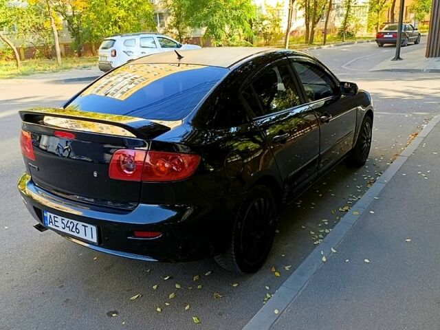 Черный Мазда 3, объемом двигателя 2 л и пробегом 281 тыс. км за 3250 $, фото 3 на Automoto.ua
