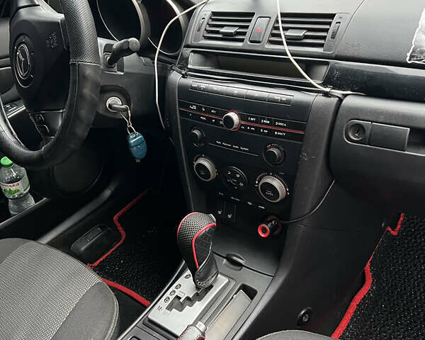 Чорний Мазда 3, об'ємом двигуна 1.6 л та пробігом 346 тис. км за 4600 $, фото 11 на Automoto.ua