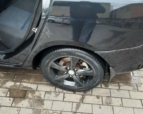 Чорний Мазда 3, об'ємом двигуна 2 л та пробігом 240 тис. км за 5999 $, фото 16 на Automoto.ua
