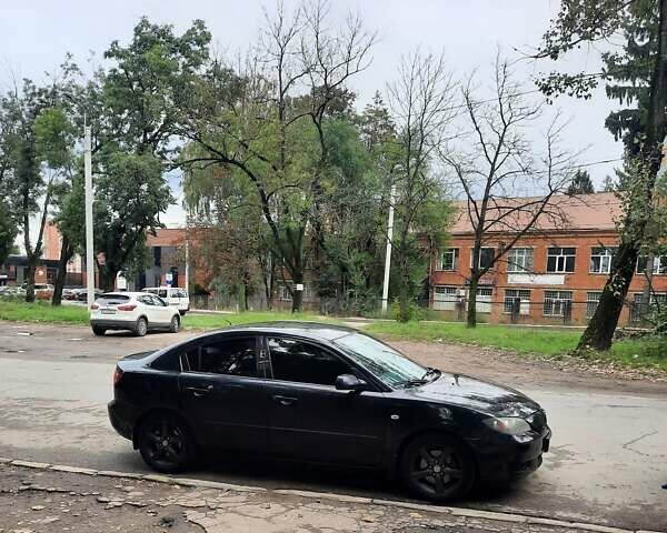 Чорний Мазда 3, об'ємом двигуна 2 л та пробігом 240 тис. км за 5999 $, фото 10 на Automoto.ua