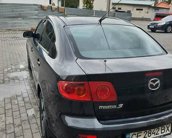 Чорний Мазда 3, об'ємом двигуна 2 л та пробігом 240 тис. км за 5999 $, фото 9 на Automoto.ua
