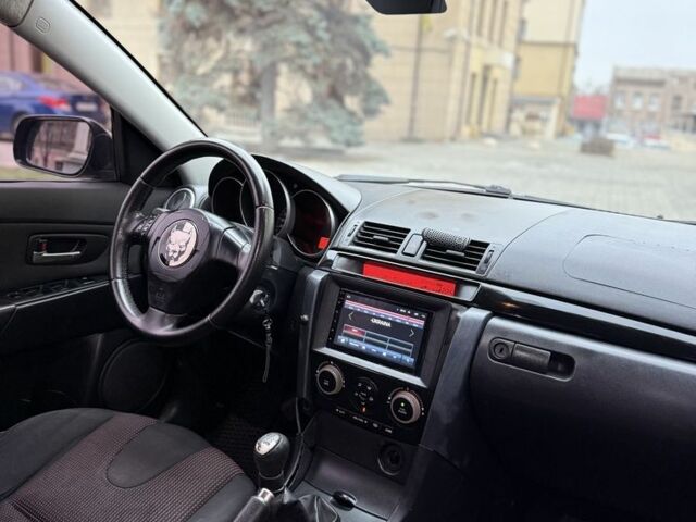 Черный Мазда 3, объемом двигателя 1.6 л и пробегом 290 тыс. км за 3650 $, фото 5 на Automoto.ua