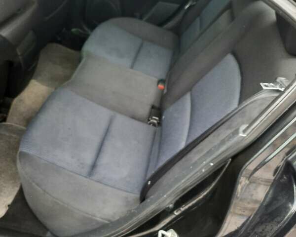 Чорний Мазда 3, об'ємом двигуна 2 л та пробігом 240 тис. км за 5999 $, фото 15 на Automoto.ua