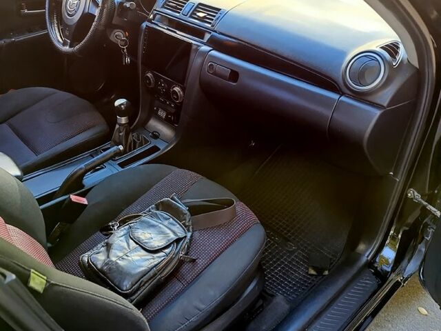 Черный Мазда 3, объемом двигателя 2 л и пробегом 281 тыс. км за 3250 $, фото 5 на Automoto.ua