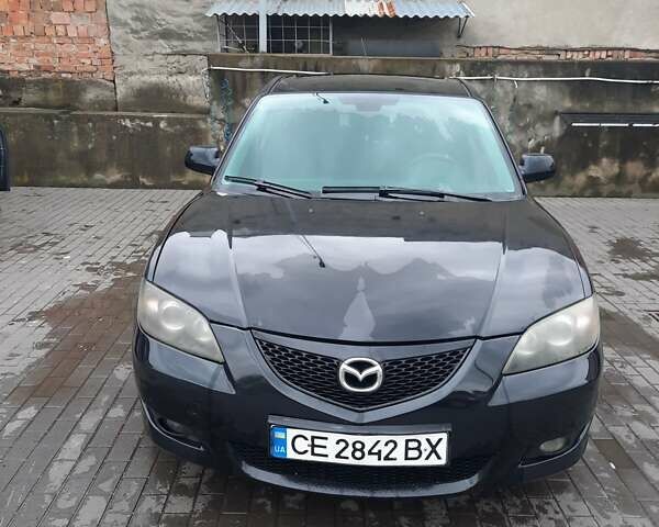 Чорний Мазда 3, об'ємом двигуна 2 л та пробігом 240 тис. км за 5999 $, фото 5 на Automoto.ua