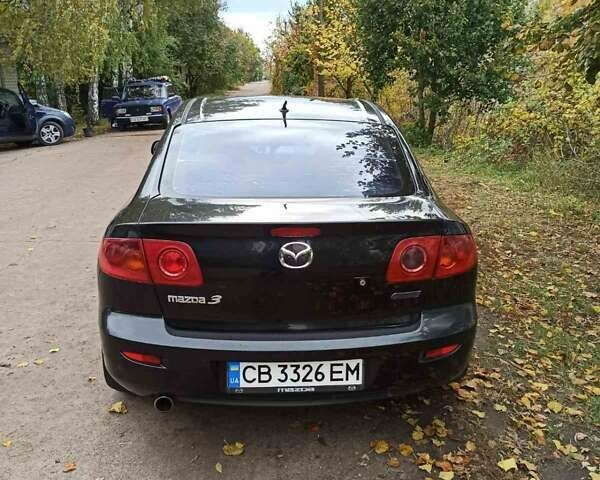 Чорний Мазда 3, об'ємом двигуна 2 л та пробігом 319 тис. км за 4000 $, фото 5 на Automoto.ua