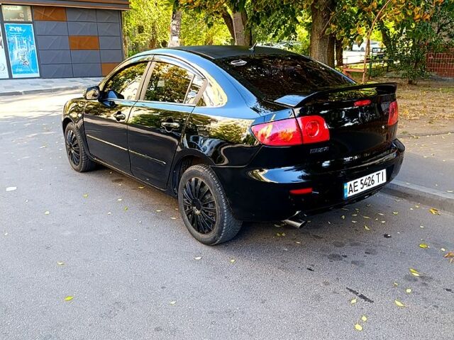 Черный Мазда 3, объемом двигателя 2 л и пробегом 281 тыс. км за 3250 $, фото 4 на Automoto.ua