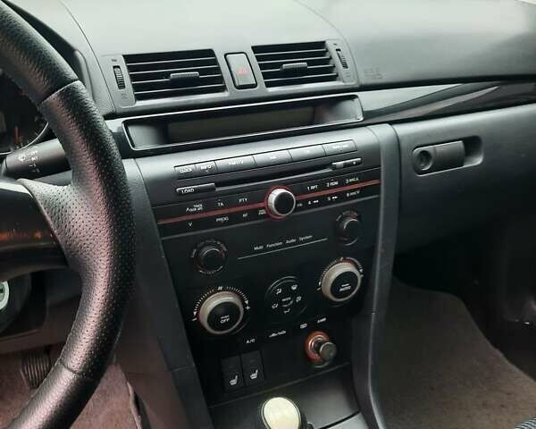 Чорний Мазда 3, об'ємом двигуна 2 л та пробігом 240 тис. км за 5999 $, фото 13 на Automoto.ua