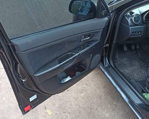 Чорний Мазда 3, об'ємом двигуна 2 л та пробігом 319 тис. км за 4000 $, фото 2 на Automoto.ua