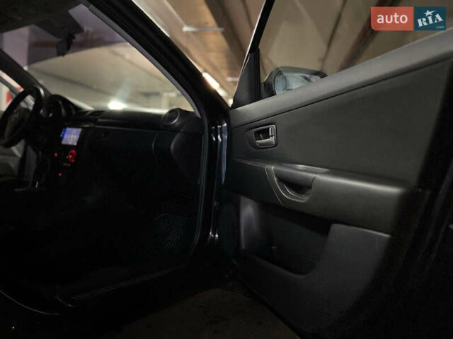 Чорний Мазда 3, об'ємом двигуна 1.6 л та пробігом 250 тис. км за 4350 $, фото 11 на Automoto.ua