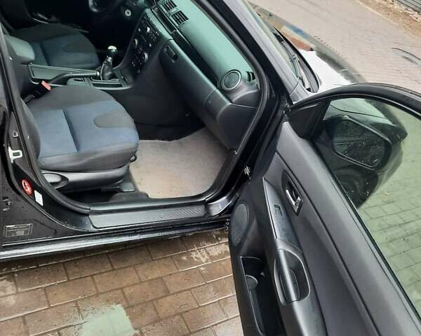 Чорний Мазда 3, об'ємом двигуна 2 л та пробігом 240 тис. км за 5999 $, фото 12 на Automoto.ua