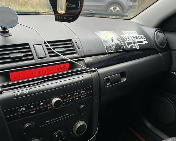 Чорний Мазда 3, об'ємом двигуна 1.6 л та пробігом 346 тис. км за 4600 $, фото 8 на Automoto.ua