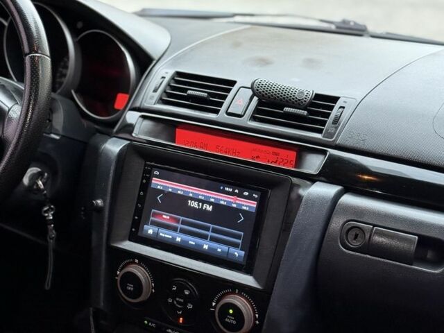 Черный Мазда 3, объемом двигателя 1.6 л и пробегом 290 тыс. км за 3650 $, фото 4 на Automoto.ua