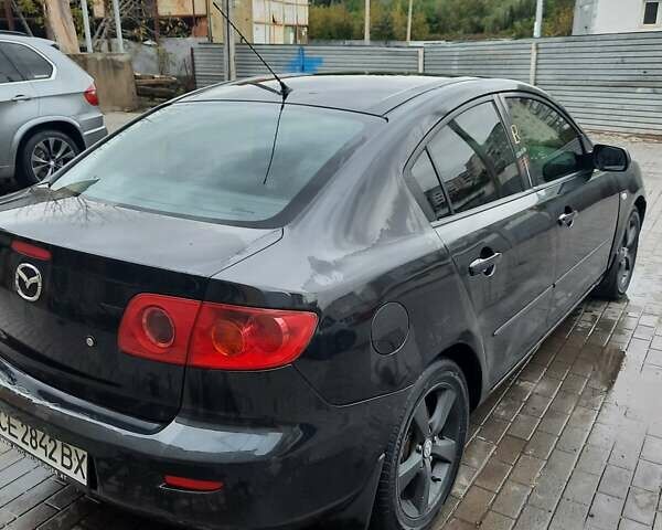 Чорний Мазда 3, об'ємом двигуна 2 л та пробігом 240 тис. км за 5999 $, фото 7 на Automoto.ua