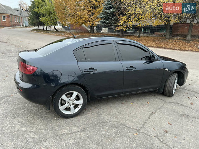 Чорний Мазда 3, об'ємом двигуна 1.6 л та пробігом 346 тис. км за 4600 $, фото 6 на Automoto.ua