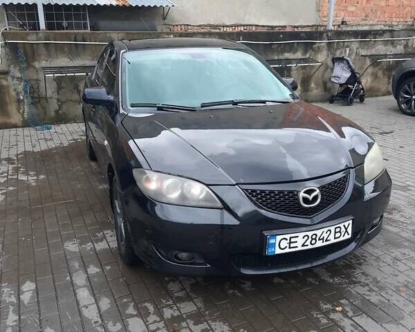Чорний Мазда 3, об'ємом двигуна 2 л та пробігом 240 тис. км за 5999 $, фото 3 на Automoto.ua