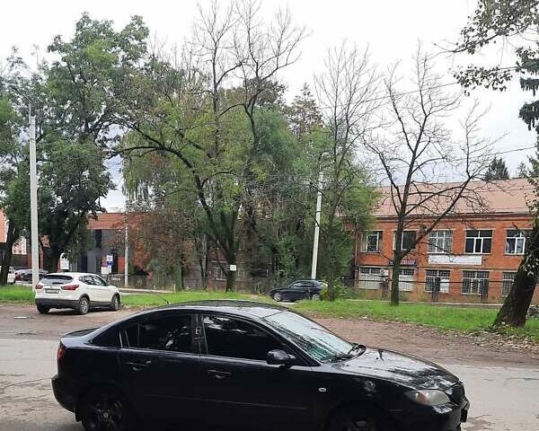 Чорний Мазда 3, об'ємом двигуна 2 л та пробігом 240 тис. км за 5999 $, фото 8 на Automoto.ua