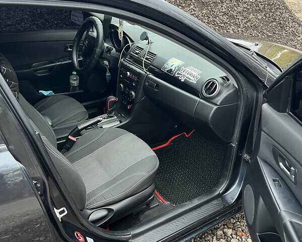 Чорний Мазда 3, об'ємом двигуна 1.6 л та пробігом 346 тис. км за 4600 $, фото 10 на Automoto.ua