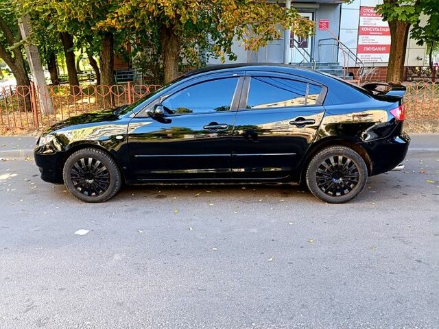 Черный Мазда 3, объемом двигателя 2 л и пробегом 281 тыс. км за 3250 $, фото 2 на Automoto.ua