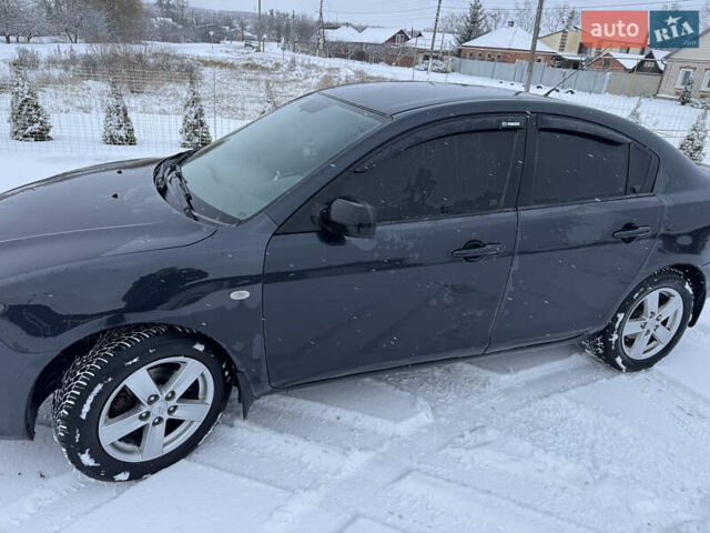 Черный Мазда 3, объемом двигателя 1.6 л и пробегом 348 тыс. км за 4500 $, фото 1 на Automoto.ua