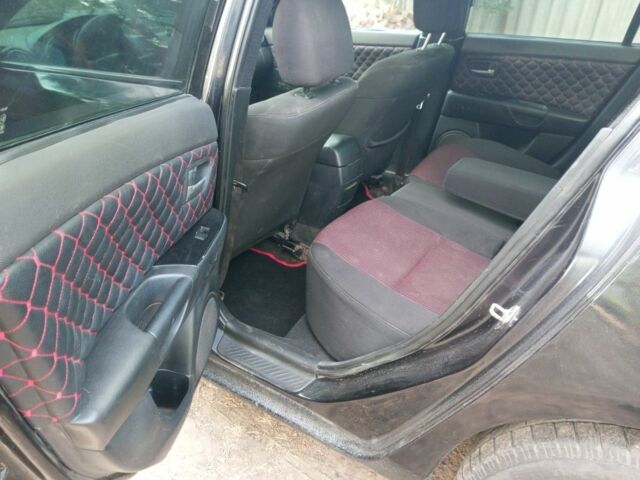 Чорний Мазда 3, об'ємом двигуна 1.6 л та пробігом 325 тис. км за 3750 $, фото 13 на Automoto.ua