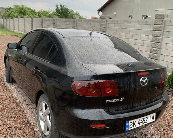 Чорний Мазда 3, об'ємом двигуна 1.6 л та пробігом 210 тис. км за 4700 $, фото 1 на Automoto.ua