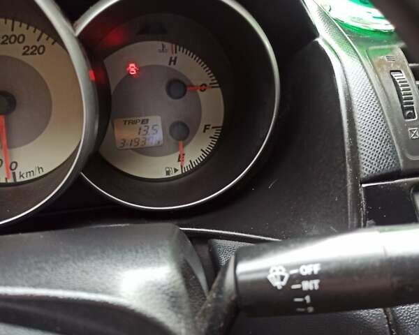 Чорний Мазда 3, об'ємом двигуна 2 л та пробігом 319 тис. км за 4000 $, фото 4 на Automoto.ua