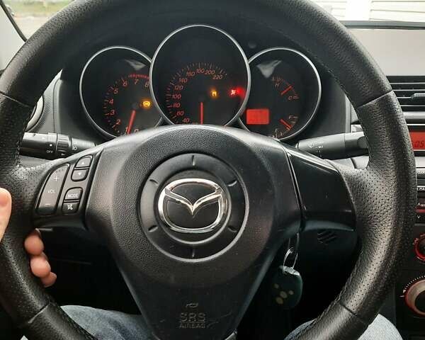 Чорний Мазда 3, об'ємом двигуна 2 л та пробігом 240 тис. км за 5999 $, фото 6 на Automoto.ua