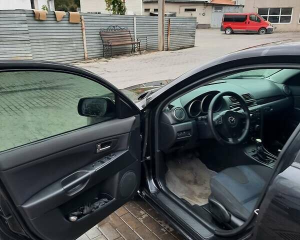 Чорний Мазда 3, об'ємом двигуна 2 л та пробігом 240 тис. км за 5999 $, фото 18 на Automoto.ua