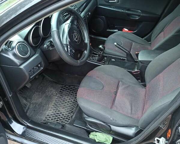 Чорний Мазда 3, об'ємом двигуна 2 л та пробігом 319 тис. км за 4000 $, фото 1 на Automoto.ua
