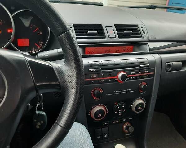 Чорний Мазда 3, об'ємом двигуна 2 л та пробігом 240 тис. км за 5999 $, фото 2 на Automoto.ua
