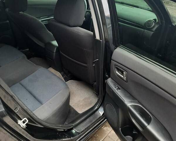 Чорний Мазда 3, об'ємом двигуна 2 л та пробігом 240 тис. км за 5999 $, фото 11 на Automoto.ua