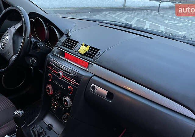Черный Мазда 3, объемом двигателя 2 л и пробегом 292 тыс. км за 3700 $, фото 9 на Automoto.ua
