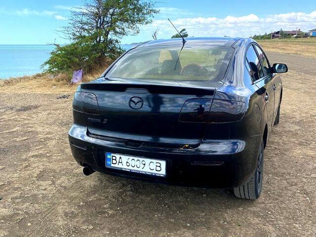 Чорний Мазда 3, об'ємом двигуна 1.6 л та пробігом 325 тис. км за 3500 $, фото 3 на Automoto.ua