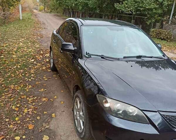 Чорний Мазда 3, об'ємом двигуна 2 л та пробігом 319 тис. км за 4000 $, фото 7 на Automoto.ua