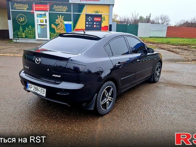 Черный Мазда 3, объемом двигателя 2 л и пробегом 173 тыс. км за 4600 $, фото 4 на Automoto.ua