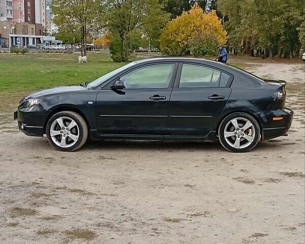 Черный Мазда 3, объемом двигателя 2 л и пробегом 242 тыс. км за 5000 $, фото 12 на Automoto.ua