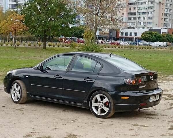 Черный Мазда 3, объемом двигателя 2 л и пробегом 242 тыс. км за 5000 $, фото 17 на Automoto.ua