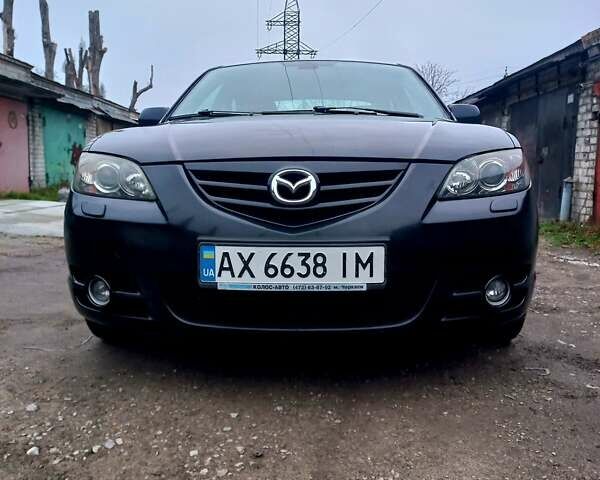 Чорний Мазда 3, об'ємом двигуна 2 л та пробігом 245 тис. км за 5200 $, фото 4 на Automoto.ua