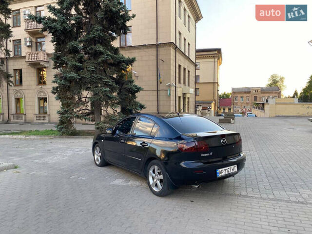 Черный Мазда 3, объемом двигателя 2 л и пробегом 300 тыс. км за 5200 $, фото 4 на Automoto.ua