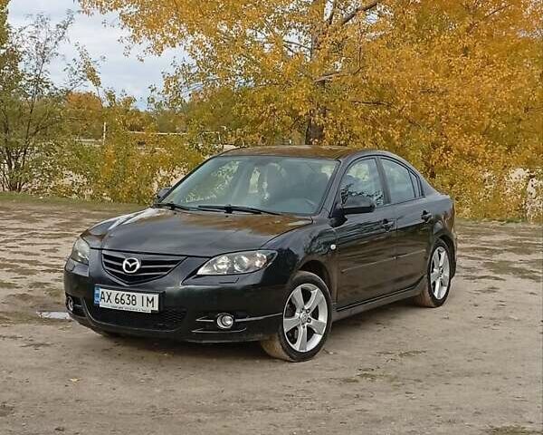Черный Мазда 3, объемом двигателя 2 л и пробегом 242 тыс. км за 5000 $, фото 24 на Automoto.ua