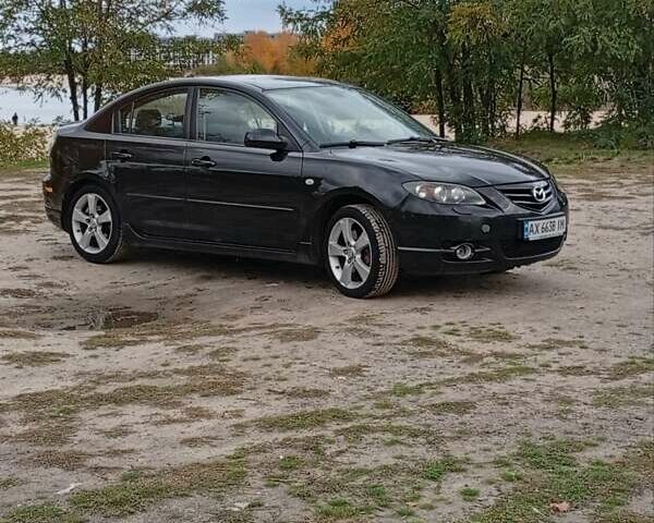 Черный Мазда 3, объемом двигателя 2 л и пробегом 242 тыс. км за 5000 $, фото 22 на Automoto.ua