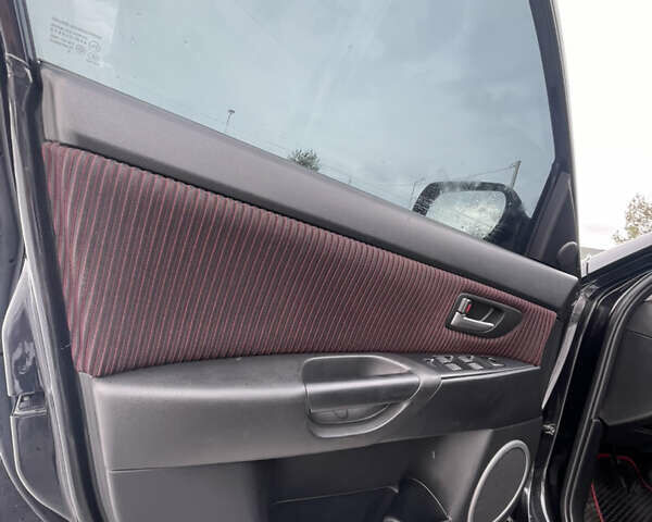 Черный Мазда 3, объемом двигателя 2 л и пробегом 266 тыс. км за 3950 $, фото 16 на Automoto.ua