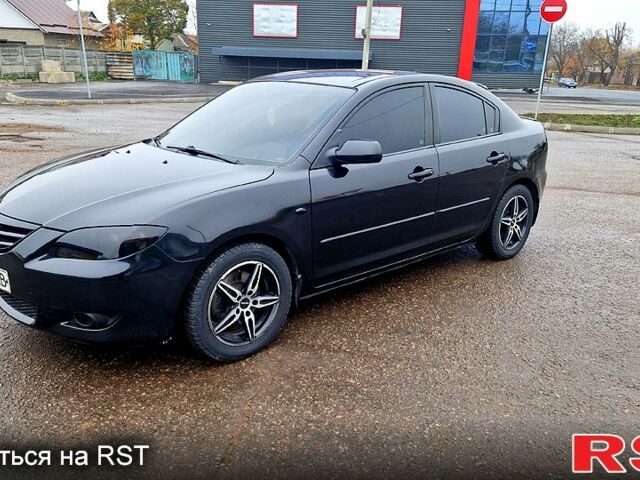 Черный Мазда 3, объемом двигателя 2 л и пробегом 173 тыс. км за 4600 $, фото 2 на Automoto.ua