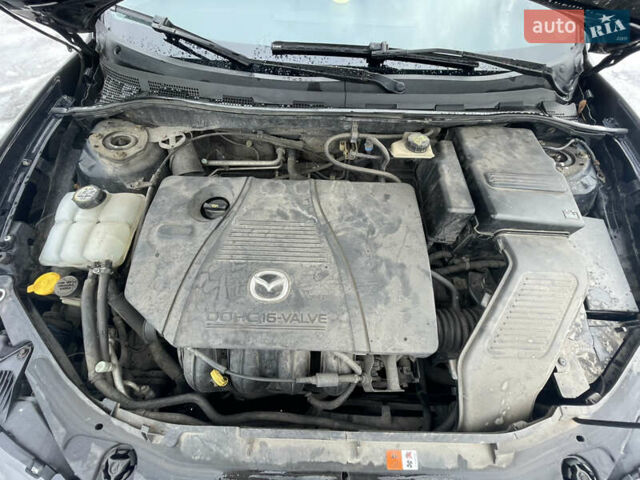 Черный Мазда 3, объемом двигателя 2 л и пробегом 266 тыс. км за 3950 $, фото 21 на Automoto.ua
